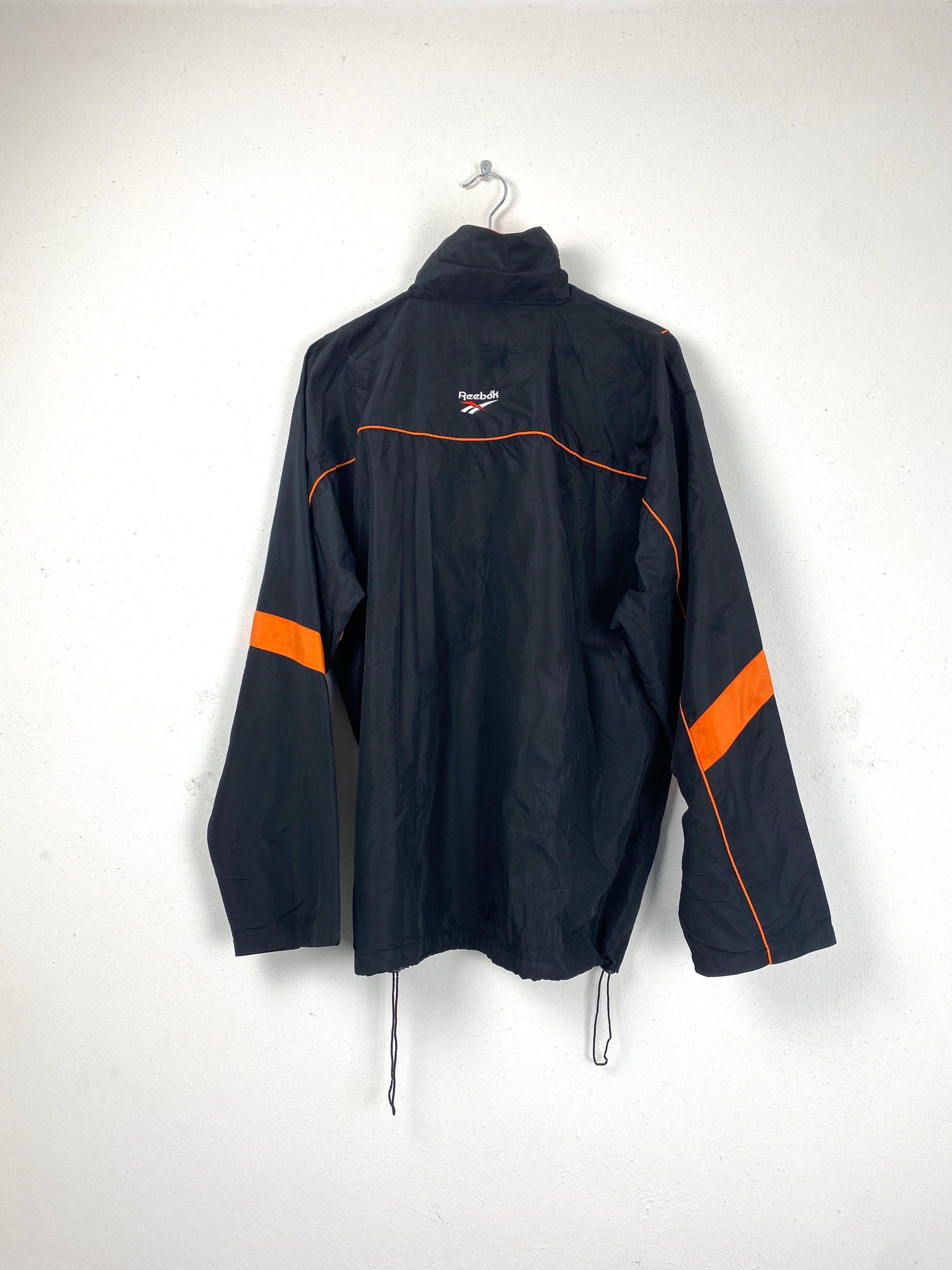 Reebok trainingsjasje zwart oranje - vintageskipakkennl